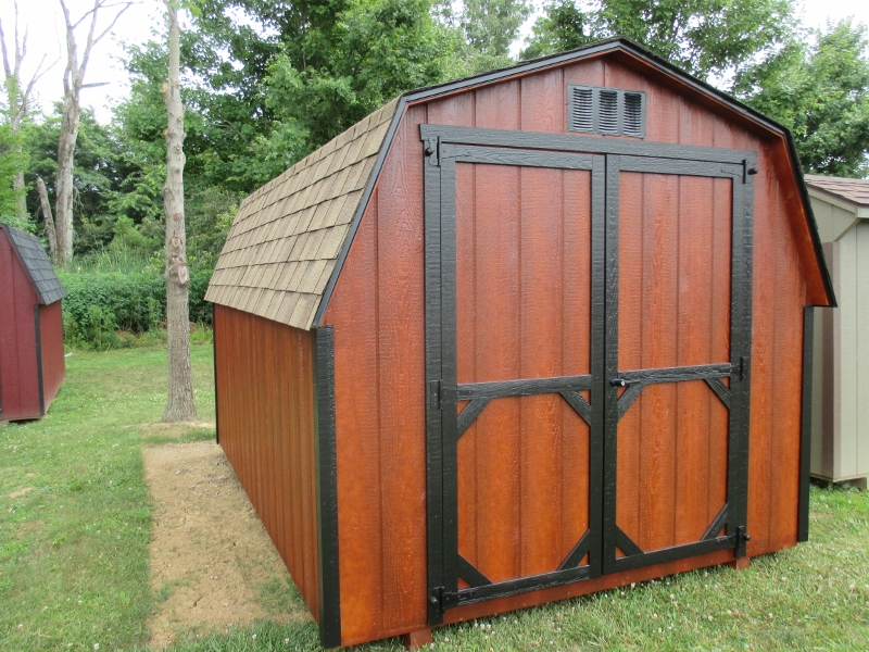 8x12 Mini Barn, Mahogany urathaned siding, Black trim, E.T. Cedar, List price $1,816.50, DISPLAY MODEL $1,634.85 Honey Brook